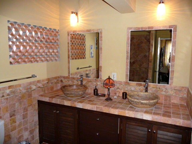 villa guest suite bedroom bath - Bathrooms include tumbled marble and stone sinks